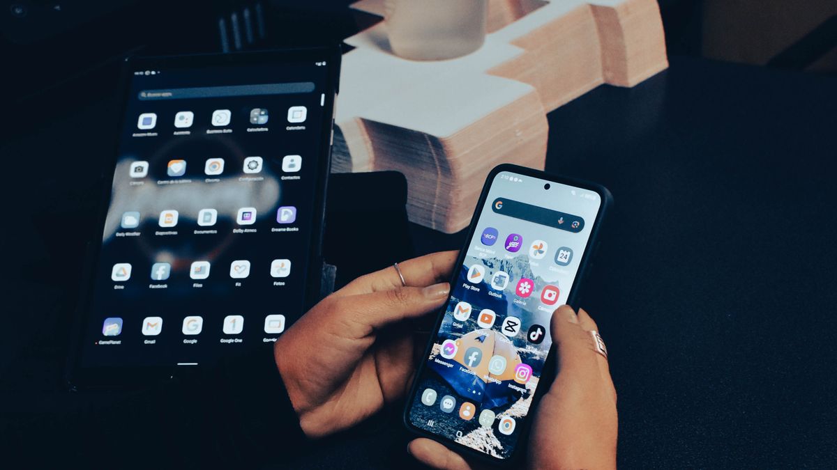 Developer testing a mobile build on a smartphone